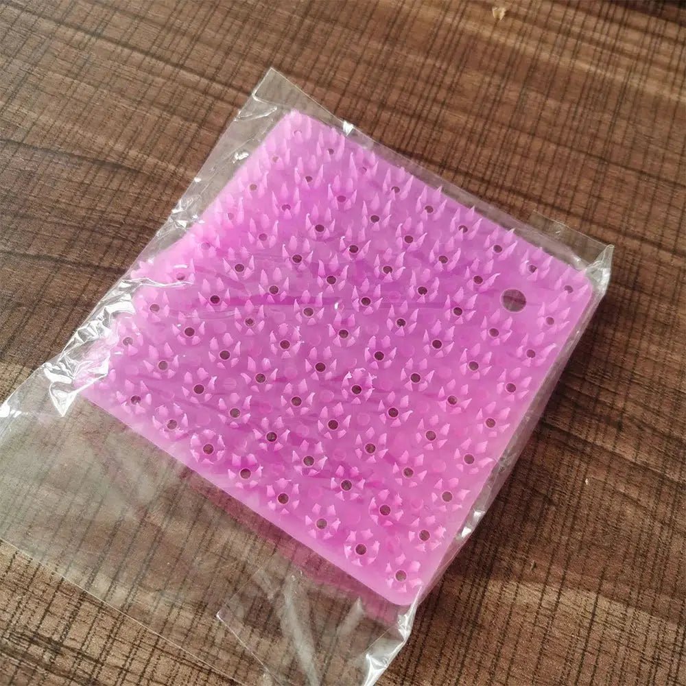 Pink silicone fruit cleaning brush